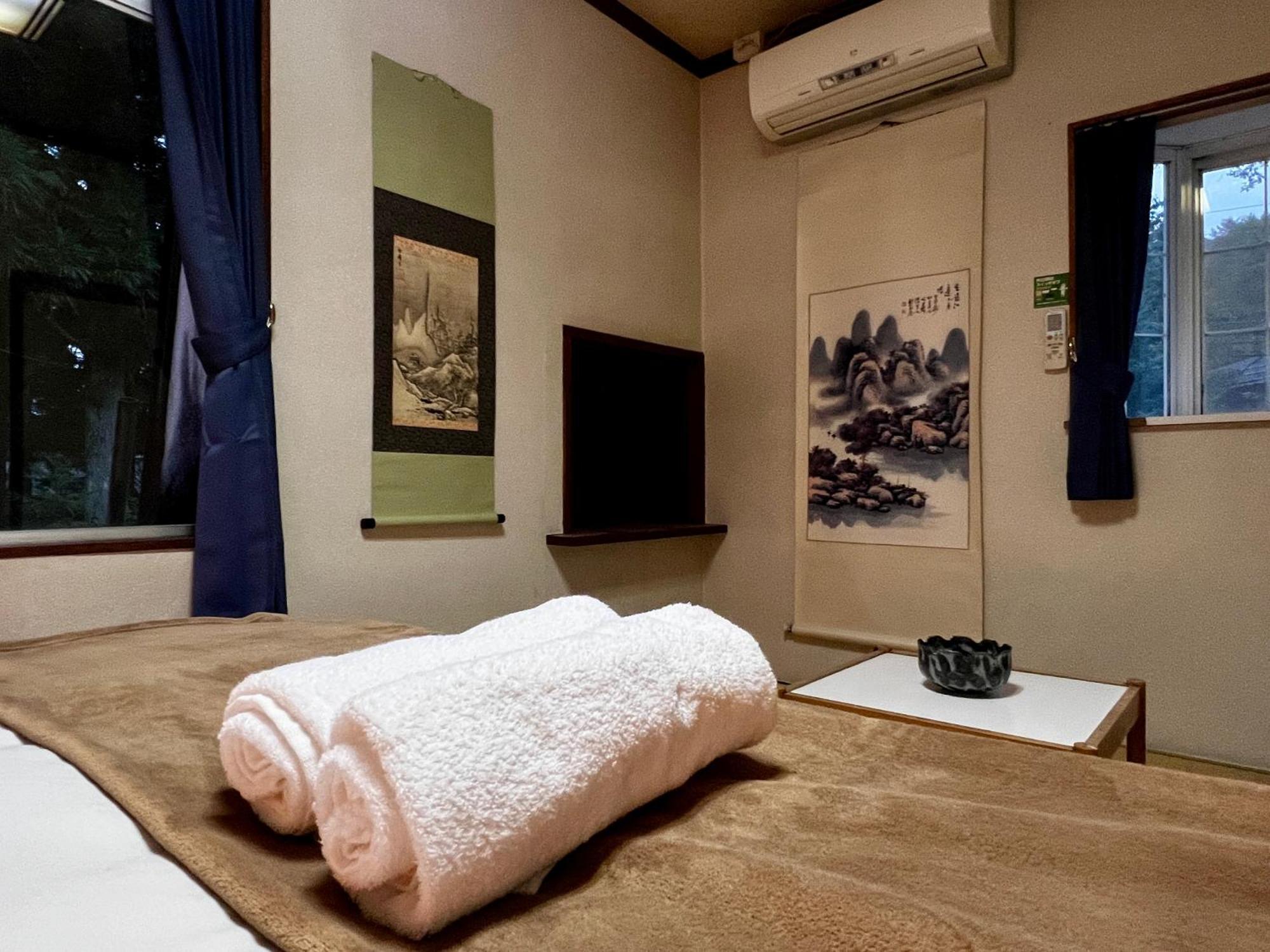 Sneaky Peaks Hotel Hakuba Bagian luar foto