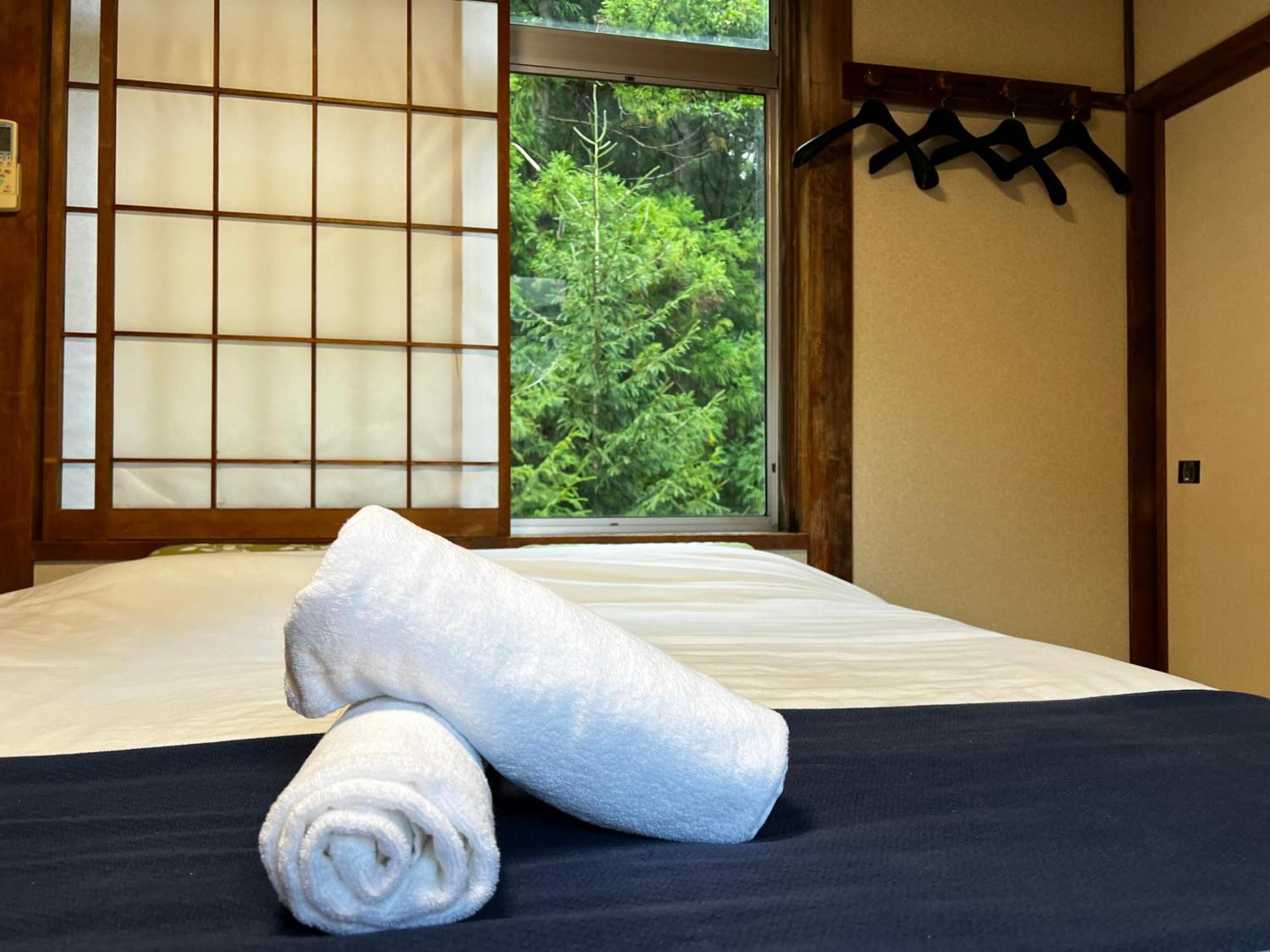 Sneaky Peaks Hotel Hakuba Bagian luar foto